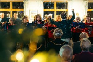 A group of people singing.